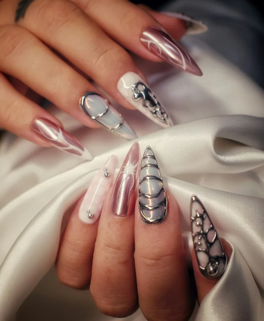 Metallic stiletto acrylic nails with crystals